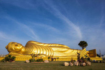 Reclining buddha with blue sky in songkhla province, thailand