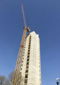 Low angle view of building against blue sky