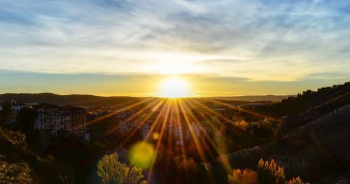 Scenic view of landscape against sky during sunset
