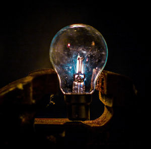 Close-up of illuminated lights at night