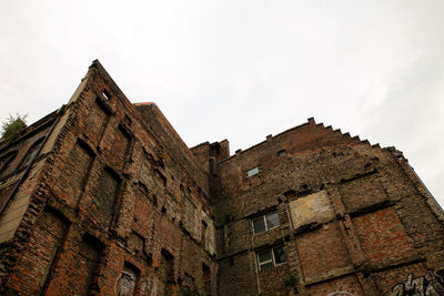 Low angle view of historic building against sky