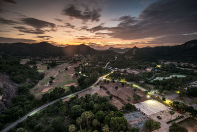 High angle view of buildings against sky during sunset