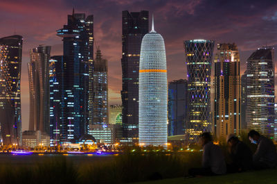 Doha city skyline illuminated at night, qatar, middle east