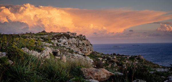 Scenic view of sea against sky during sunset