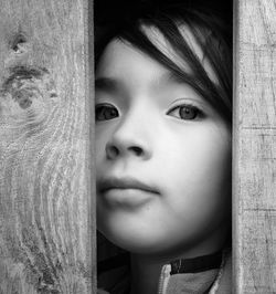 Close-up portrait of girl looking down