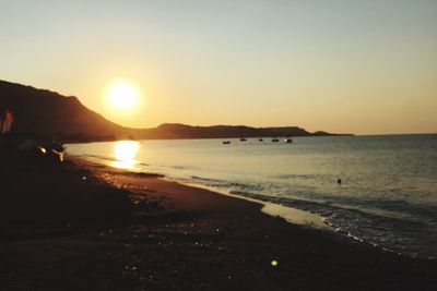 Scenic view of sea at sunset