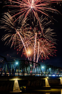 Firework display at night