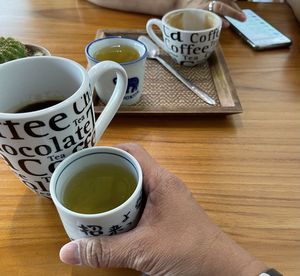 High angle view of coffee cup on table