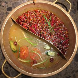 High angle view of chili peppers in container