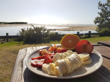 Close-up of fruits in plate on table