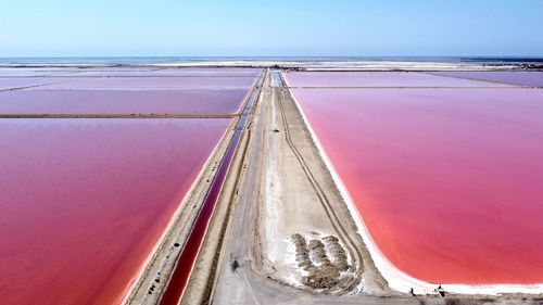 Scenic view of salt bassin against sky