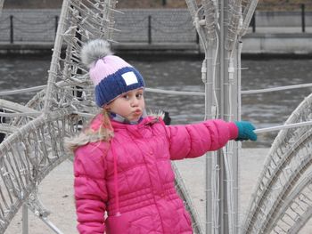 Close-up of girl standing in snow