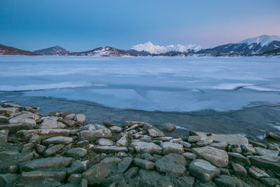 Winter cold night in the frozen campotosto lake, abruzzo