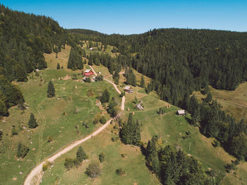 High angle view of trees on field against sky