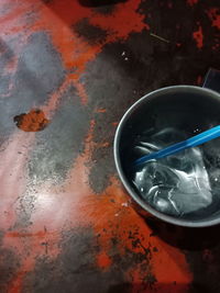 High angle view of cigarette in bowl on table