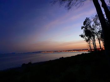 Scenic view of sea against sky at sunset