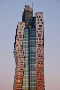 Low angle view of modern building against sky