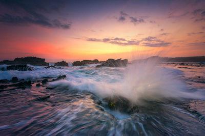 Scenic view of sea against sky during sunset