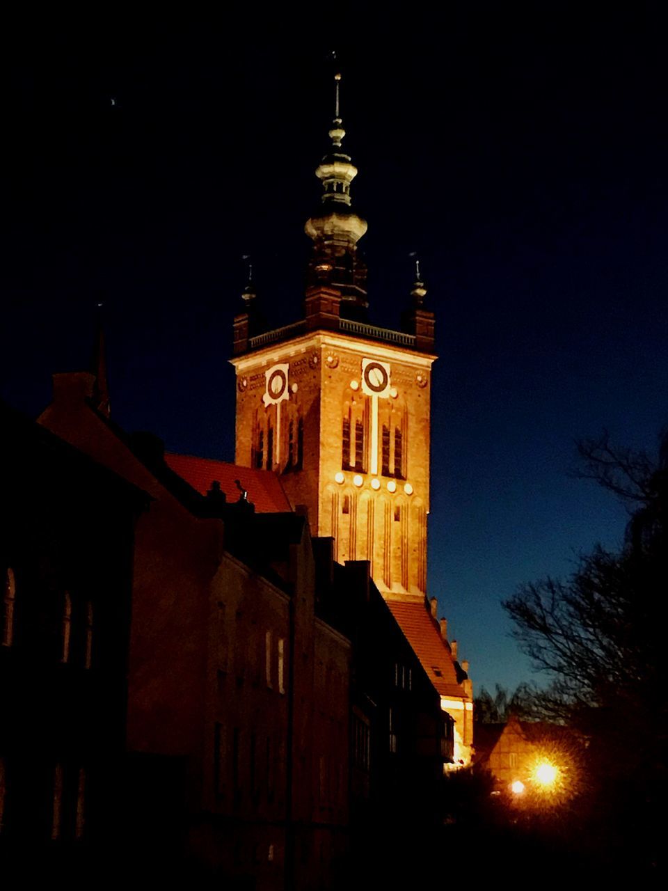 architecture, building exterior, night, built structure, religion, spirituality, no people, place of worship, low angle view, sky, outdoors, illuminated, moon, bell tower, city