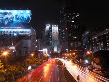 Traffic on city street at night