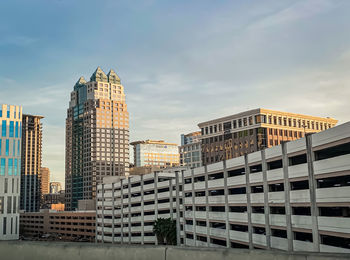 A cityscape photo of downtown orlando, florida at sunrise.