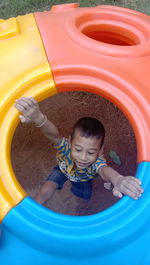 High angle view of boy playing at playground