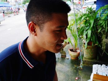 Close-up portrait of young man with ice cream