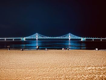 View of suspension bridge at beach