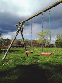 Close-up of playground against sky