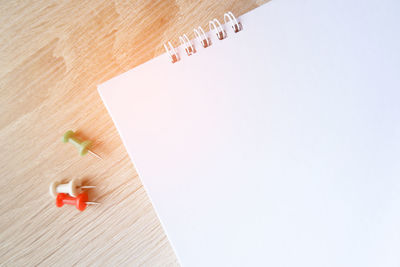High angle view of paper on table