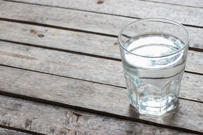 High angle view of water in glass on table