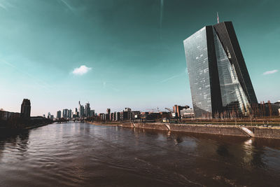 View of buildings in city against sky