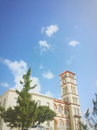 Low angle view of historic tower against blue sky