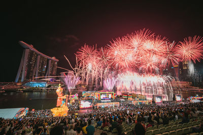 Firework display at night