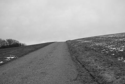 Road on landscape against sky