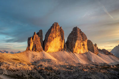 Panoramic view of rocky mountains against sky