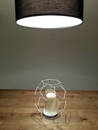 Close-up of lamp on table