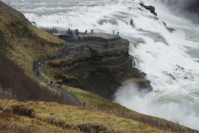 High angle view of cliff by sea at gullfoss waterfall iceland