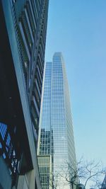 Low angle view of skyscrapers against sky