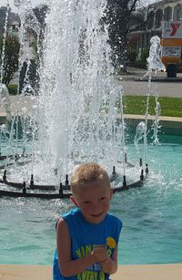 Boy playing in water