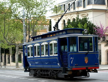 Cable car on street in city