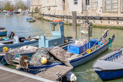 High angle view of boats moored at harbor