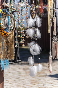 Close-up of decorations hanging in market