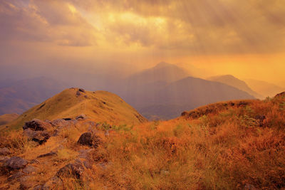 Scenic view of mountains against sky during sunset