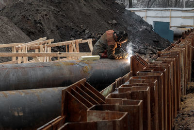 Man working on staircase in winter