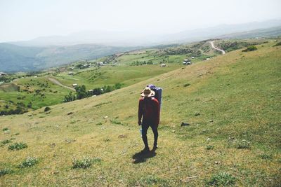 Man standing on hill