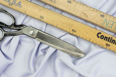 High angle view of tape measure on table