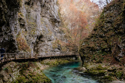 Scenic view of river amidst mountains