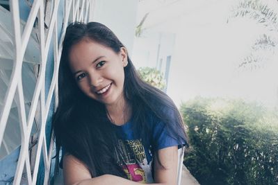 Portrait of smiling young woman
