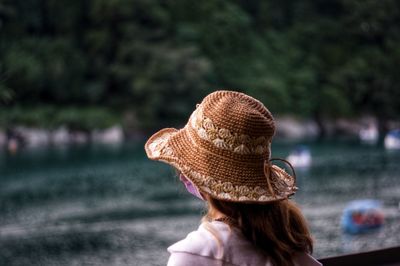 Rear view of woman wearing hat